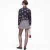 Blusa con lazo y ojales Trompe L’Oeil Blusa con lazo y ojales Trompe L’Oeil