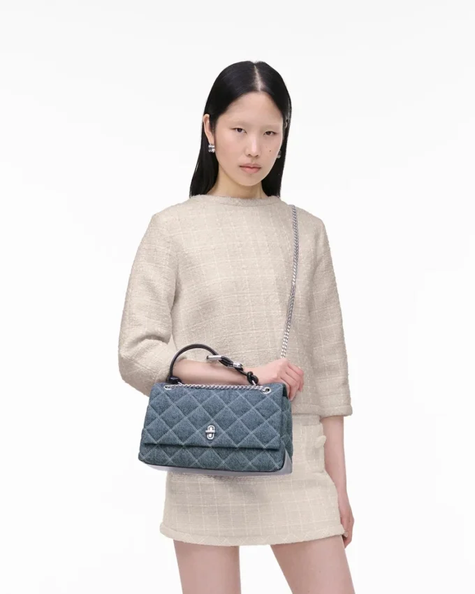 Bolso bandolera convertible doble de denim acolchado