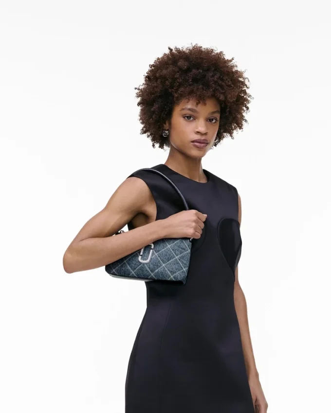 Bolso bandolera convertible The Snapshot de denim acolchado