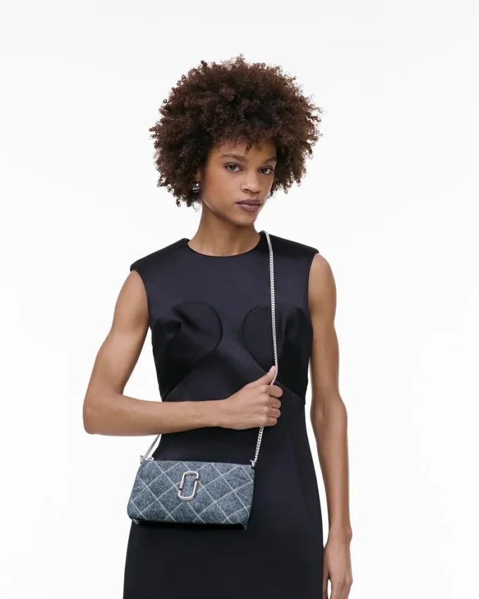 Bolso bandolera convertible The Snapshot de denim acolchado