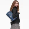 Bolso doble grande de denim con charms Bolso doble grande de denim con charms