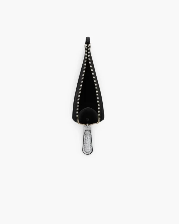 Cartera con cremallera superior y charm recubierta de purpurina para el día a día