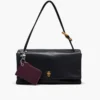 Cartera con cremallera superior y charms