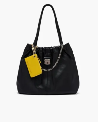 Cartera con cremallera superior y charms