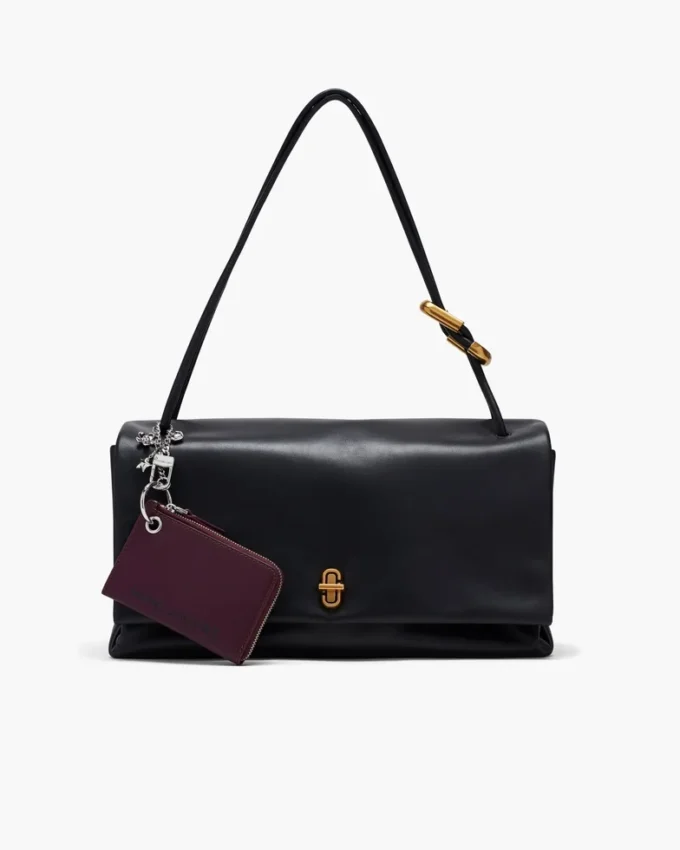 Cartera con cremallera superior y charms