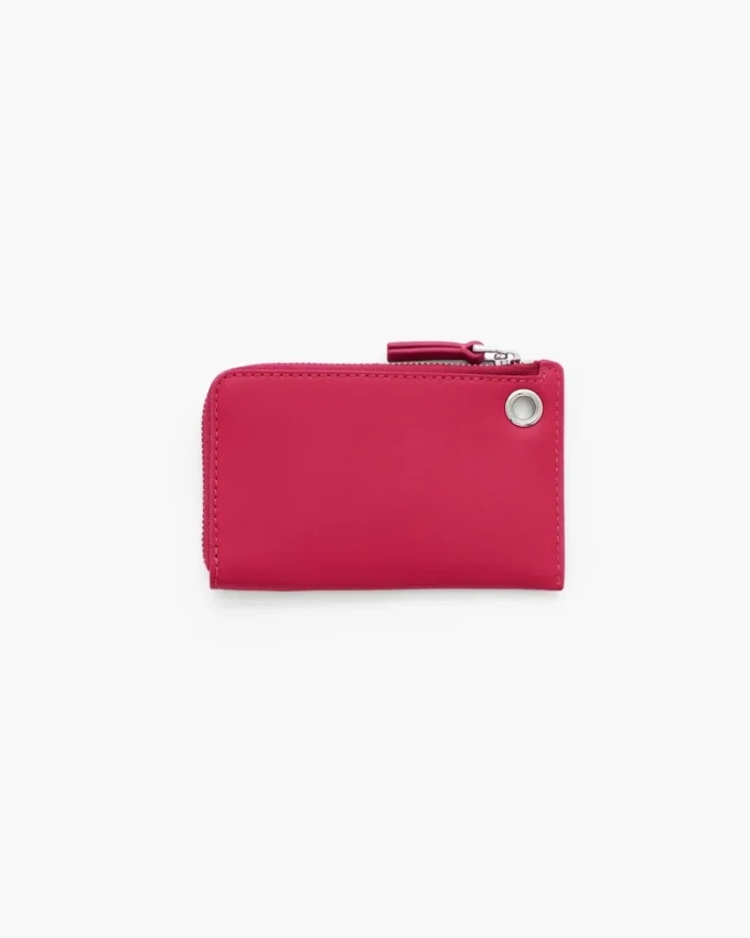 Cartera con cremallera superior y charms Cartera con cremallera superior y charms