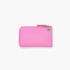 Cartera con cremallera superior y charms Cartera con cremallera superior y charms