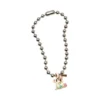 Collar con oso llorando