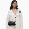El bolso mini con doble cadena El bolso mini con doble cadena