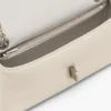 El bolso mini con doble cadena El bolso mini con doble cadena