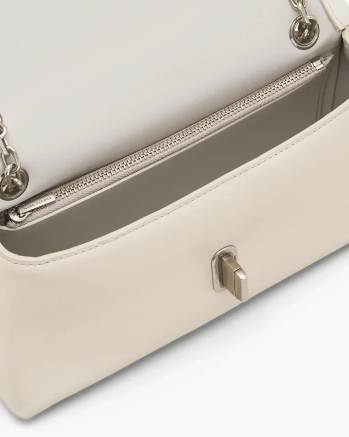 El bolso mini con doble cadena El bolso mini con doble cadena