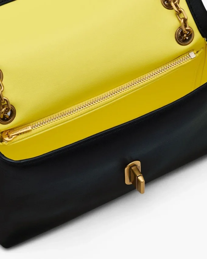 El bolso mini con doble cadena El bolso mini con doble cadena
