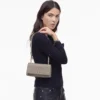El bolso mini con doble cadena