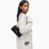 El bolso mini con doble cadena El bolso mini con doble cadena