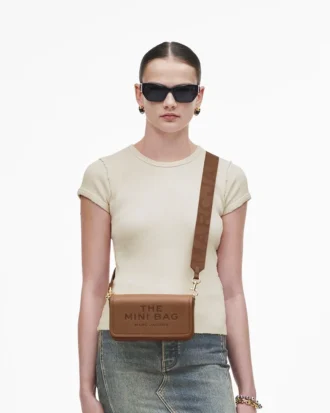 El mini bolso de piel El mini bolso de piel
