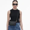 El mini bolso de piel El mini bolso de piel