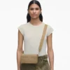 El mini bolso de piel El mini bolso de piel