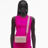 El mini bolso de piel El mini bolso de piel