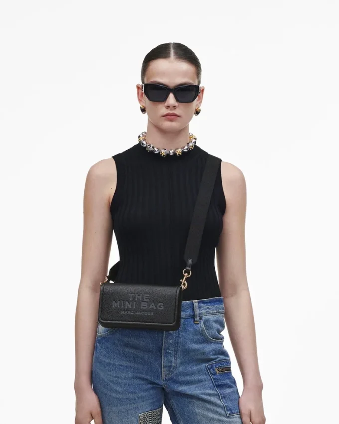El mini bolso de piel El mini bolso de piel
