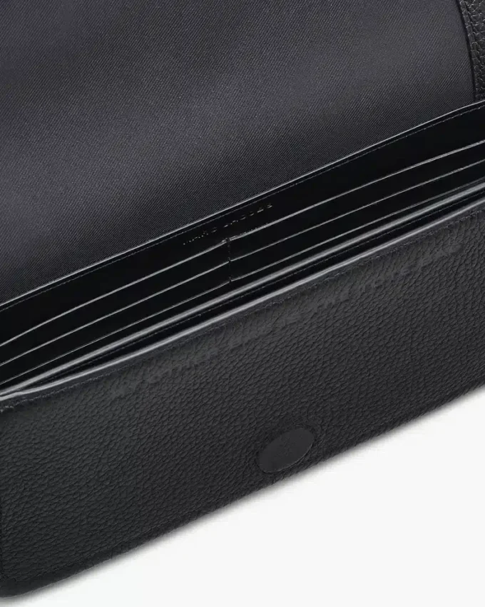El mini bolso de piel El mini bolso de piel