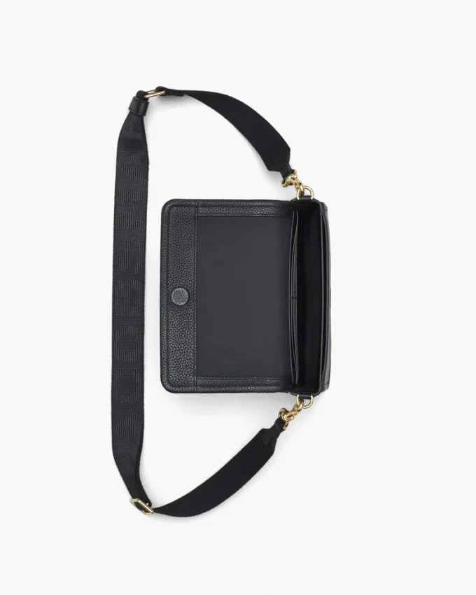 El mini bolso de piel El mini bolso de piel