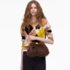 El pequeño bolso de mano Glam de piel sintética