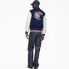 La chaqueta universitaria A.P.C. X Marc Jacobs