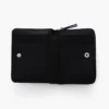 La mini cartera compacta de piel La mini cartera compacta de piel