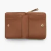 La mini cartera compacta de piel La mini cartera compacta de piel