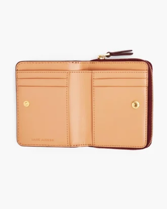 La mini cartera compacta de piel