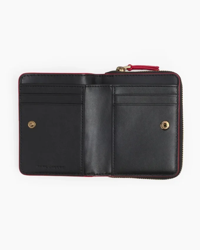 La mini cartera compacta de piel