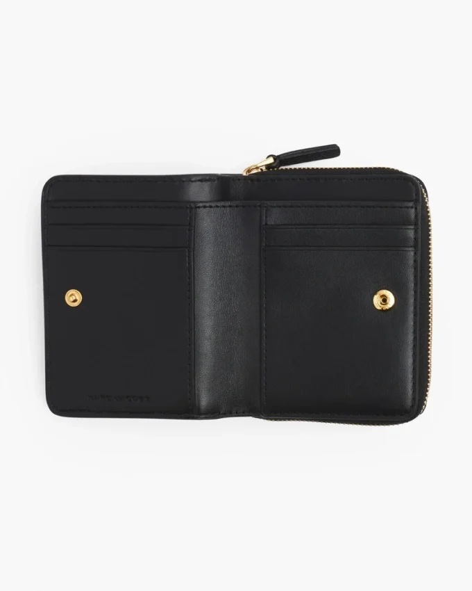 La mini cartera compacta de piel La mini cartera compacta de piel