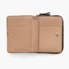 La mini cartera compacta de piel La mini cartera compacta de piel
