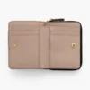 La mini cartera compacta de piel La mini cartera compacta de piel
