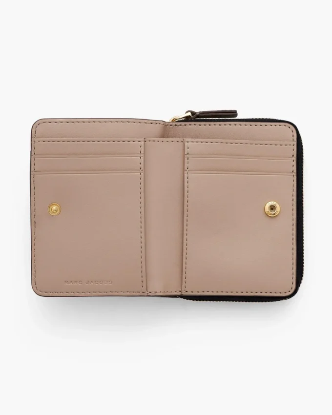 La mini cartera compacta de piel La mini cartera compacta de piel