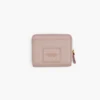 La mini cartera compacta de piel