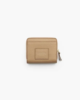 La mini cartera compacta de piel