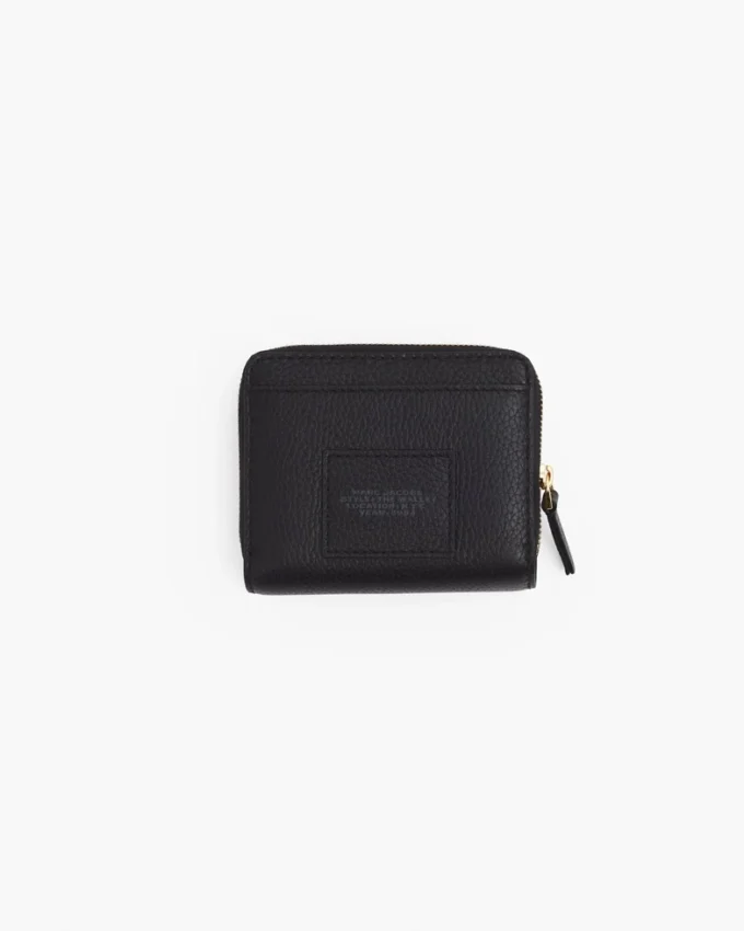 La mini cartera compacta de piel La mini cartera compacta de piel
