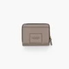 La mini cartera compacta de piel La mini cartera compacta de piel