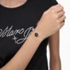 La pulsera de cadena con botones La pulsera de cadena con botones