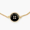 La pulsera de cadena con botones