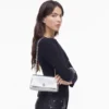 Mini bolso con doble cadena metálica Mini bolso con doble cadena metálica