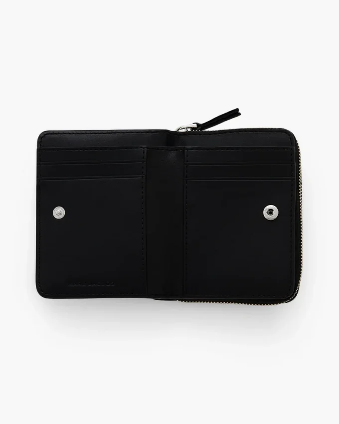Mini cartera compacta con parche adhesivo
