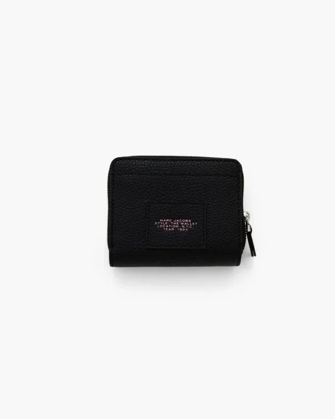 Mini cartera compacta con parche adhesivo