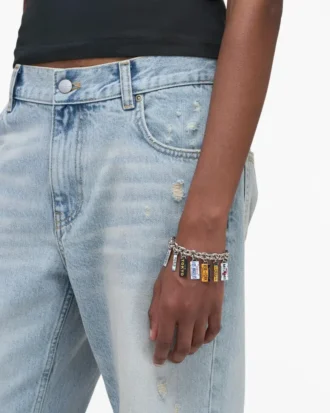 Pulsera con dijes de matrículas de ciudades