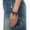 Pulsera con mini charms icónicos pavé Pulsera con mini charms icónicos pavé