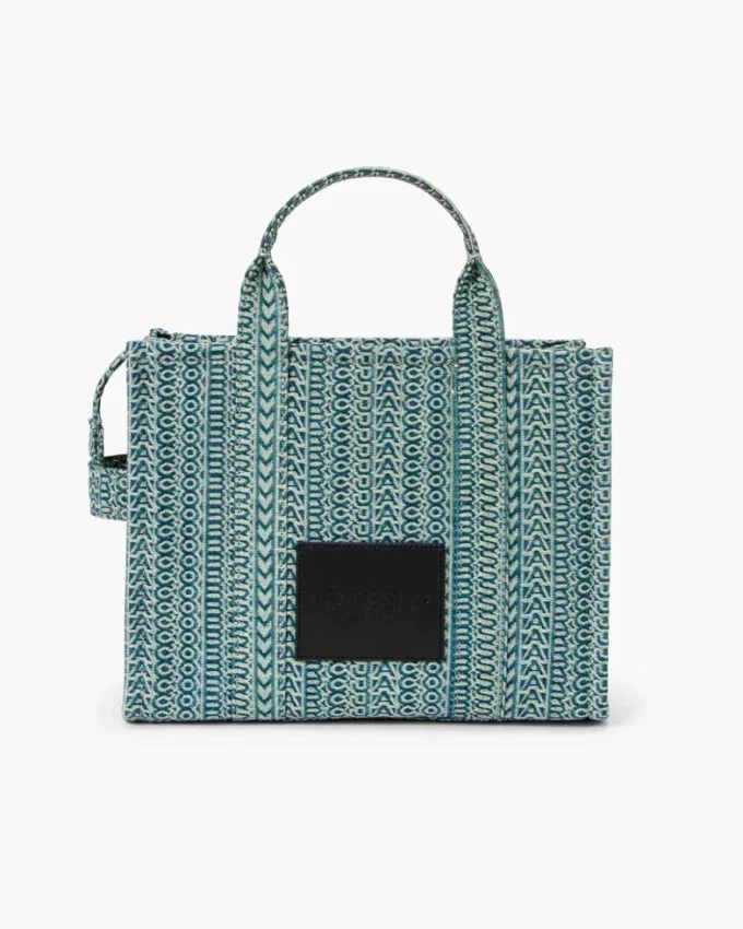 The Tote Bag mediano de denim lavado con Monogram