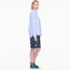 Zapatillas altas de denim con margaritas de lentejuelas