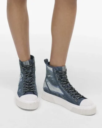 Zapatillas altas de denim rasgado y reparado